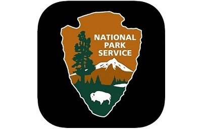 NPS arrowhead on a black square background