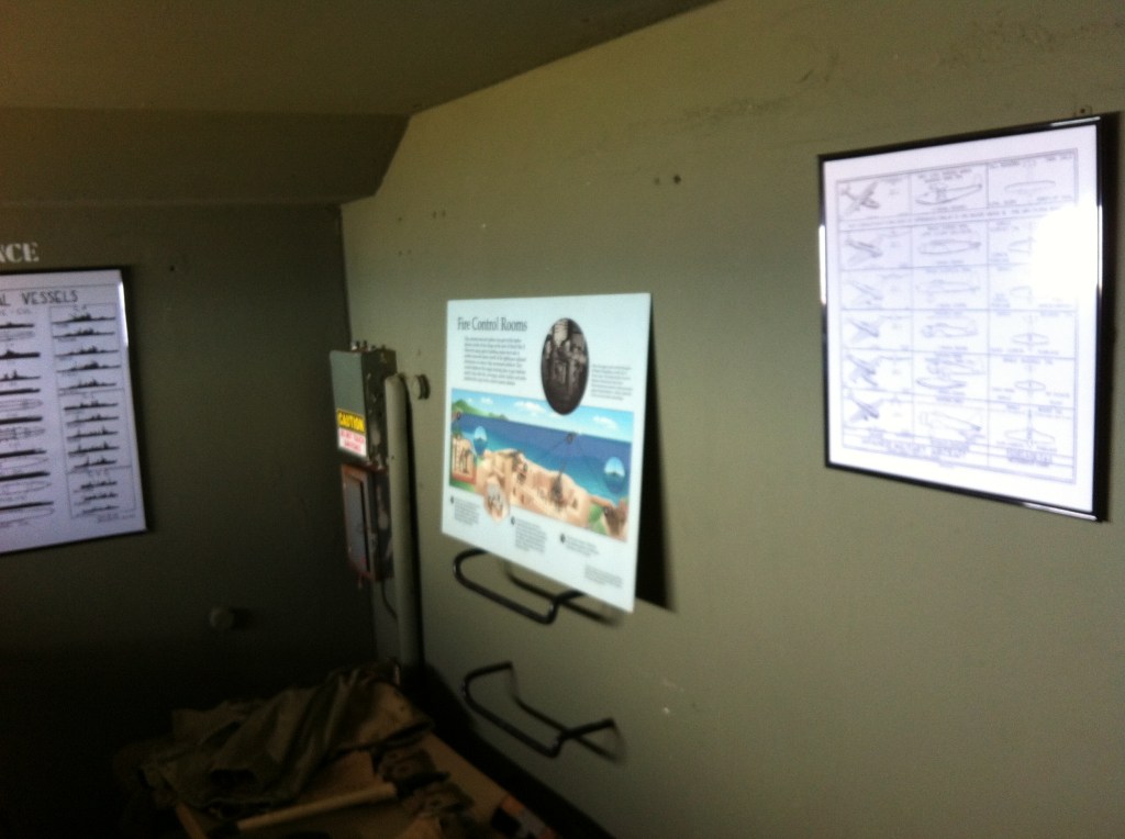 The inside of a room in the bunker. Various displays are seen on the walls.