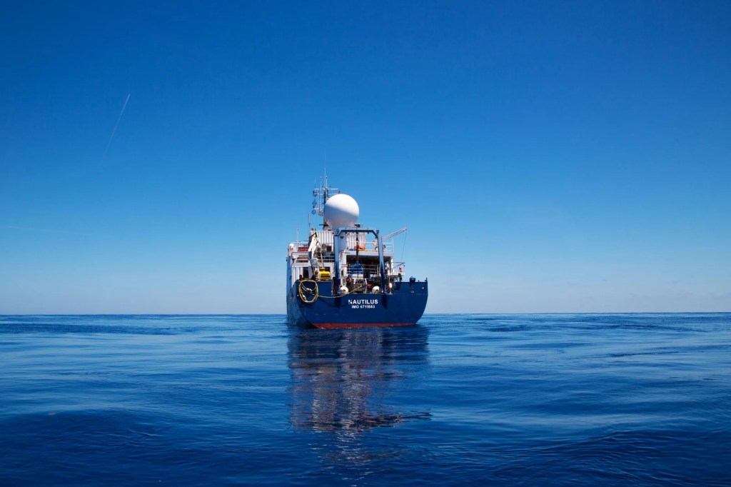 A research ship on a calm ocean