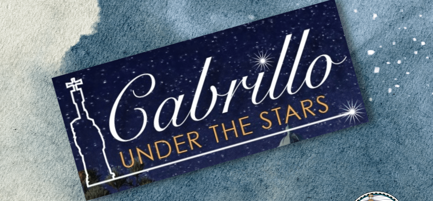 Blue rectangle with the words "Cabrillo Under the Stars" overlaying a light blue background with stars