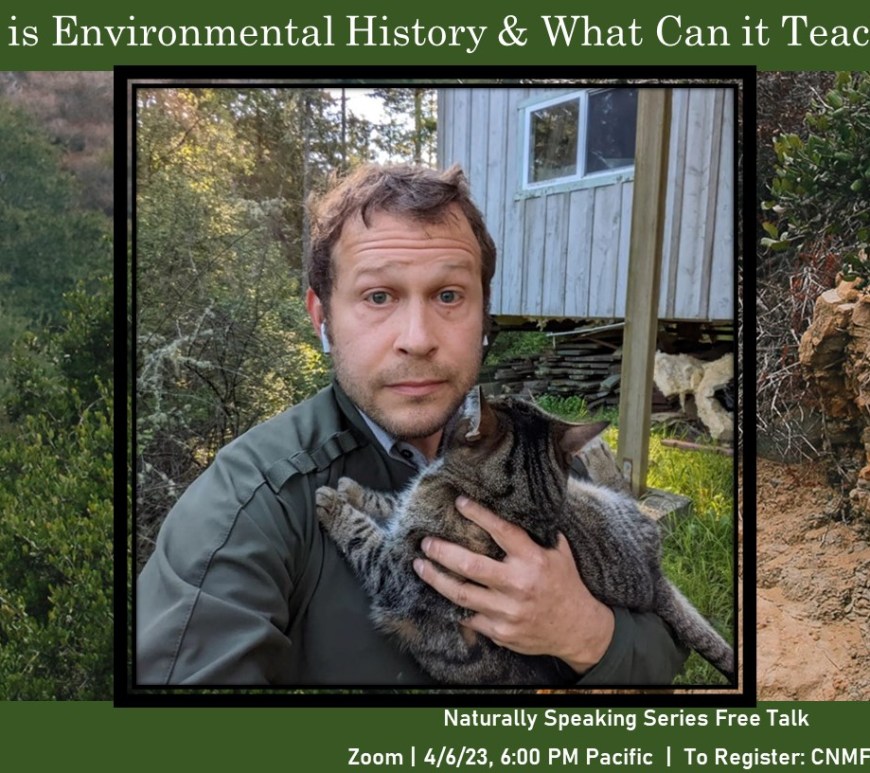 A man holding a cat.