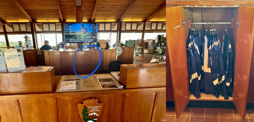 (Left) The Visitor Center Information Desk and center island of cabinets. There is a TV at the center of the “island” showing the daily park schedule. The “island” cabinet doors are closed and the cabinet in the center below the TV is circled in blue, indicating where VIP Vests are stored. (Right) The inside of the cabinet. Many blue vests with silver reflective lines are hanging off a rack.