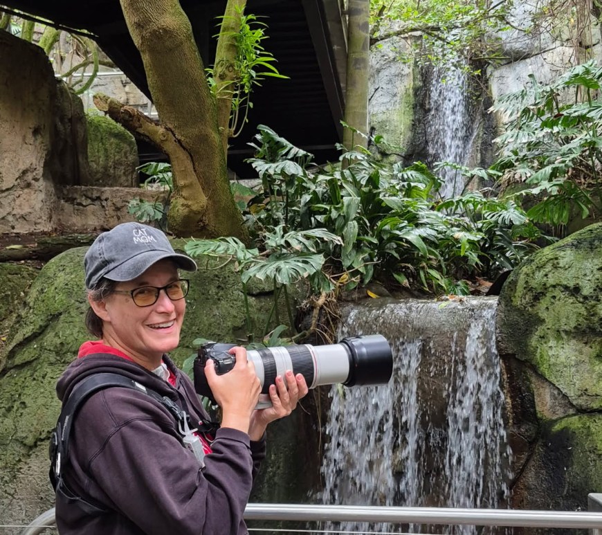 A woman with a camera